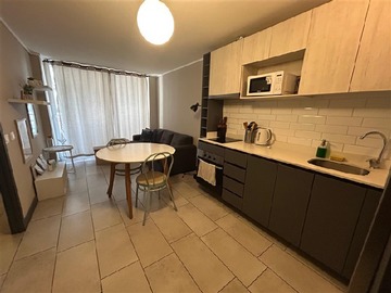 Departamento en arriendo mensual en Carmen 590, Santiago - 1 dormitorio, 1 baño