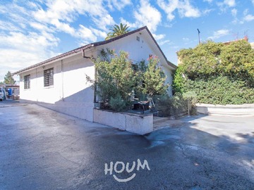 Casa en venta en Gran Avenida José Miguel Carrera, El Bosque - 5 dormitorios, 4 baños