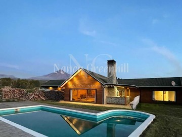 Terreno en venta en Rebajada casa con inmejorable vista y piscina (131290), Pucón - 3 dormitorios, 4 baños