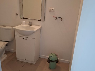 baño con instalación de lavadora