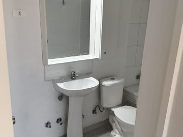 Baño con espacio lavadora