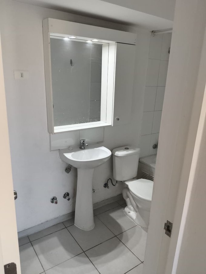 Baño con espacio lavadora