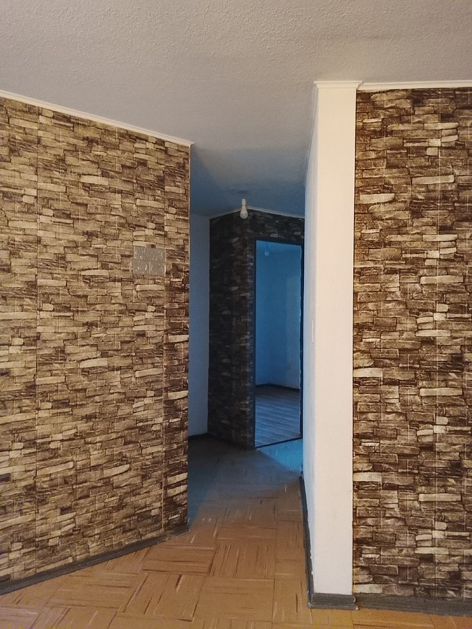 Pasillo interior que conecta habitaciones