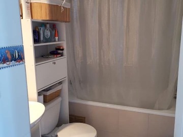 Baño con tina.