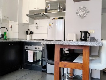 Cocina y meson comedor