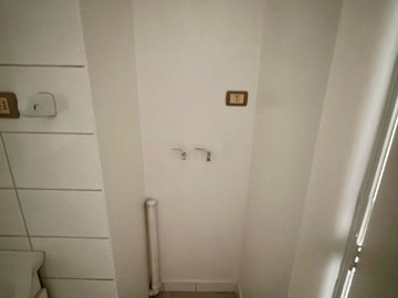 Conexión de lavadora en baño