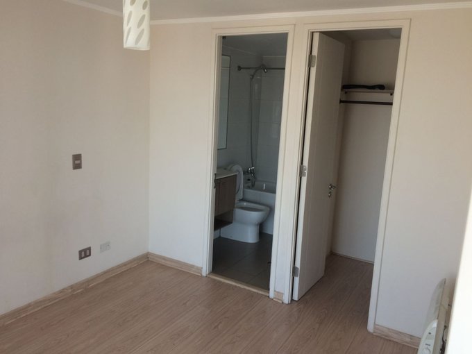 Dormitorio en Suite con Walking closet