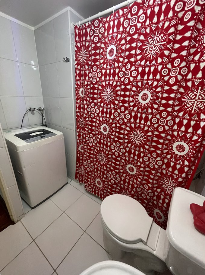 baño con espacio para lavadora