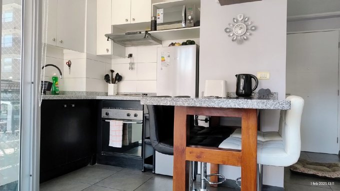 Cocina y meson comedor