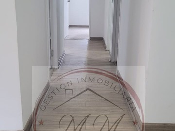 Pasillo a Dormitorios y Baños