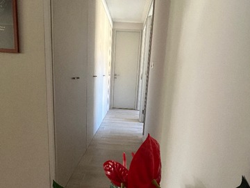 Pasillo con closet que conecta a los otros dormitorios