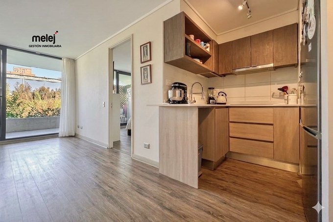 Cocina y living comedor con salida a terraza