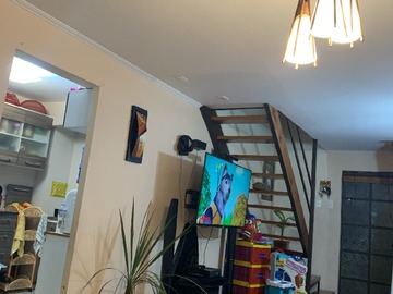 Living y entrada a cocina