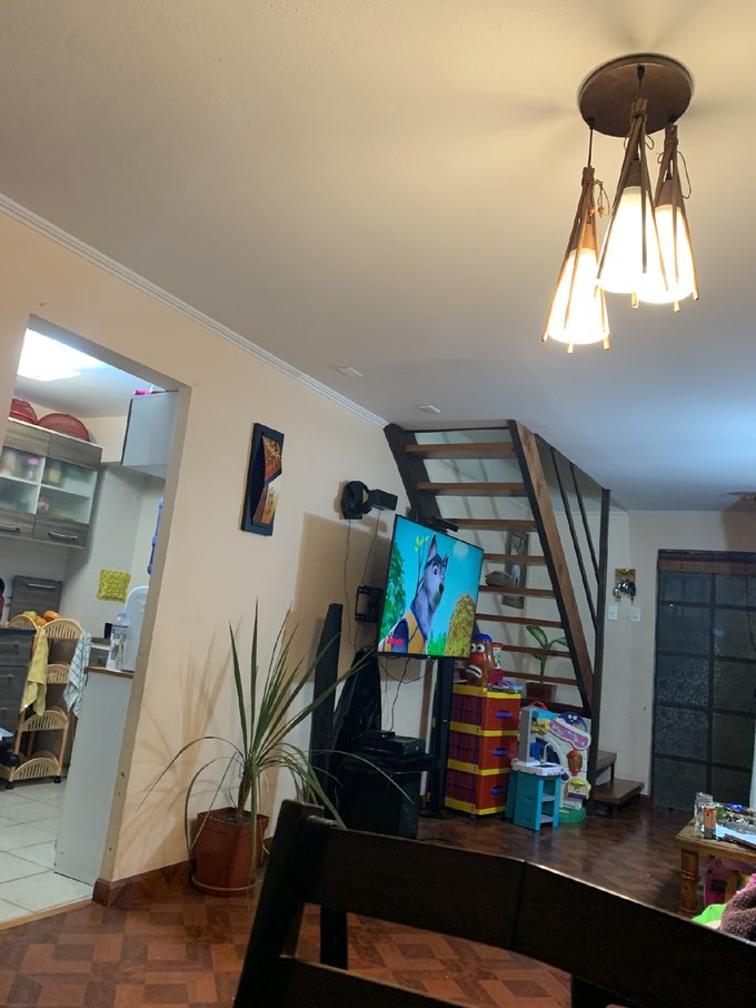 Living y entrada a cocina