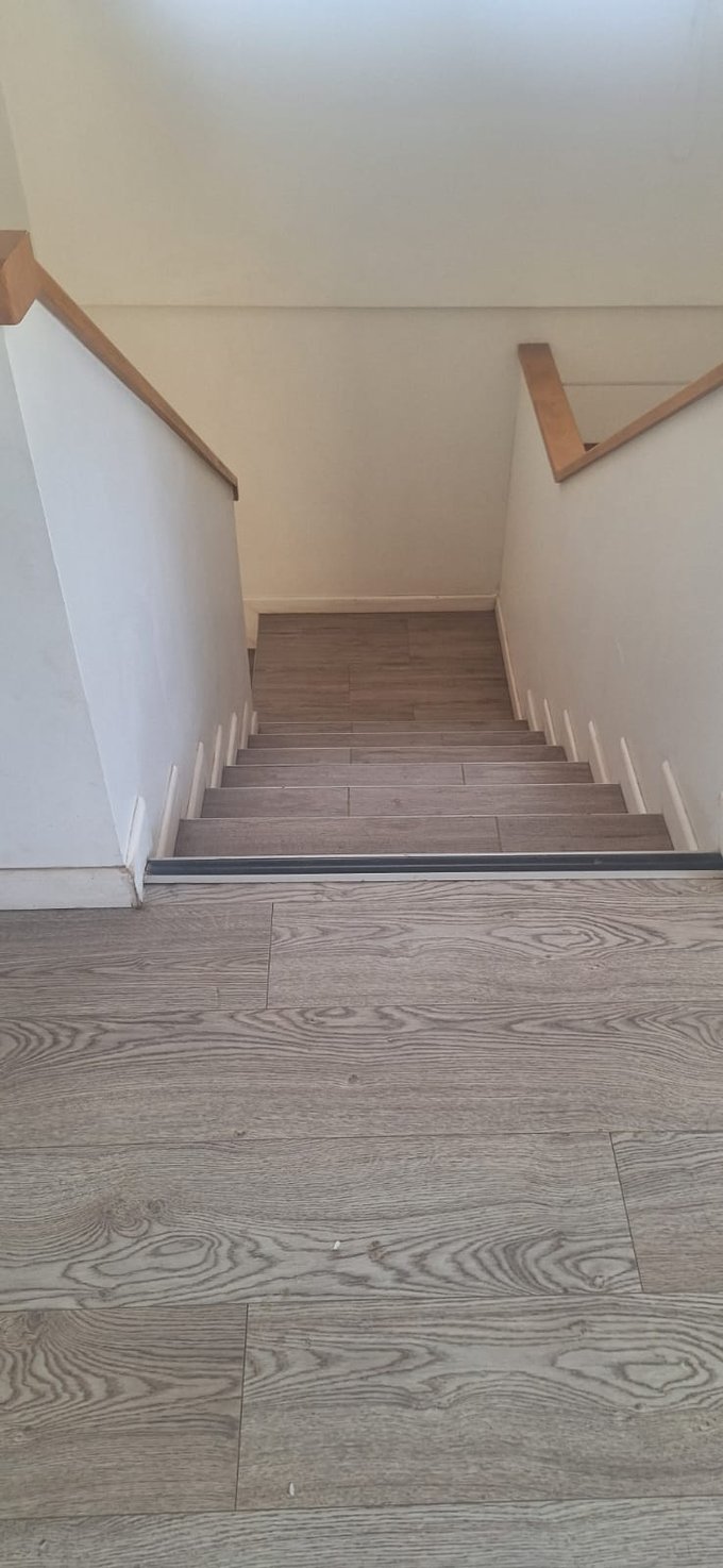 Escalera con Descanso