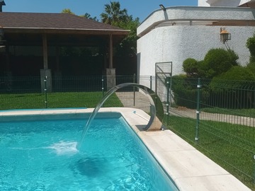 Piscina temperada con hidromasaje y luces