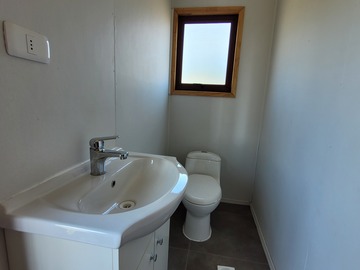 Baño de bodega externa