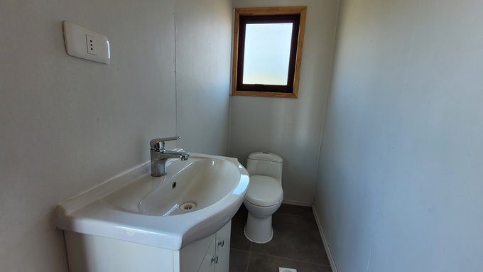 Baño de bodega externa