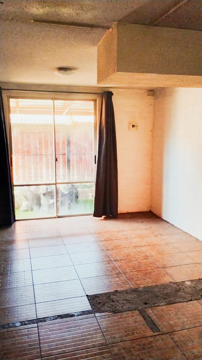 Living y acceso a terraza