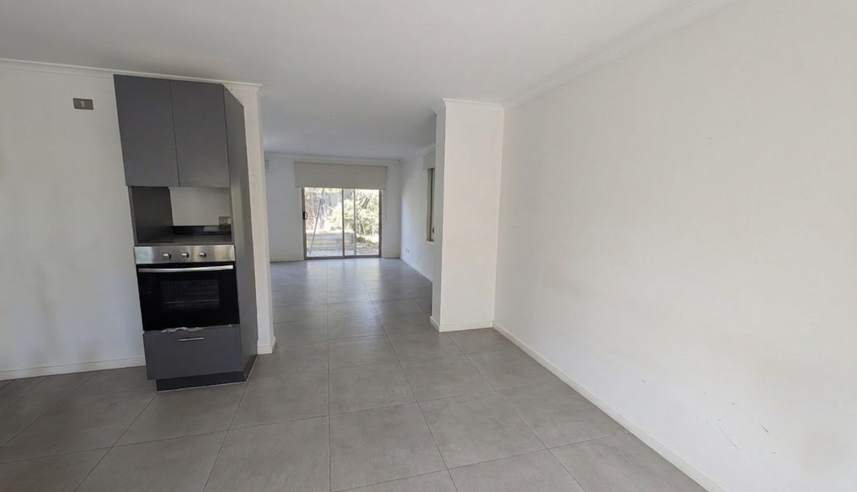 25.- Comedor hacia Living.
