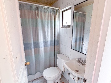 Baño de servicio