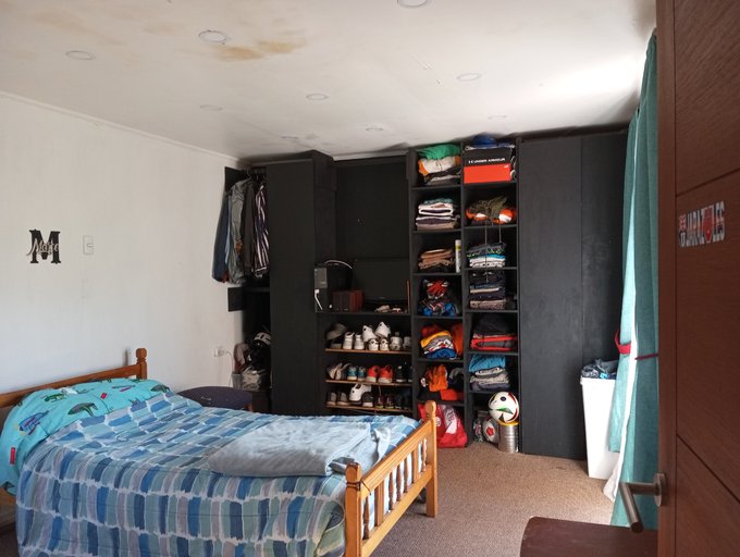 Dormitorio con baño en suite, wolking closet y balcón