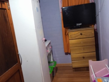 mueble con TV de dormitorio