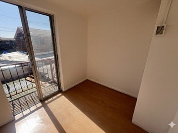 Dormitorio balcón
