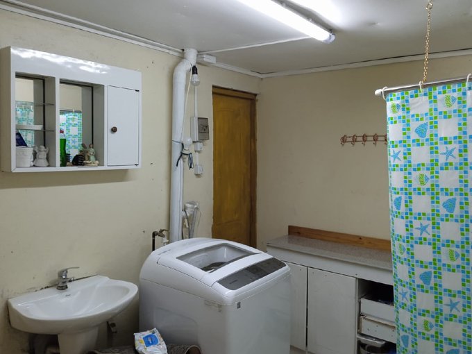 Baño (sala) con lavaroda