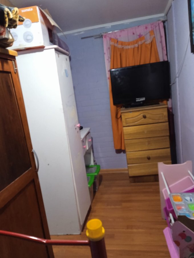 mueble con TV de dormitorio
