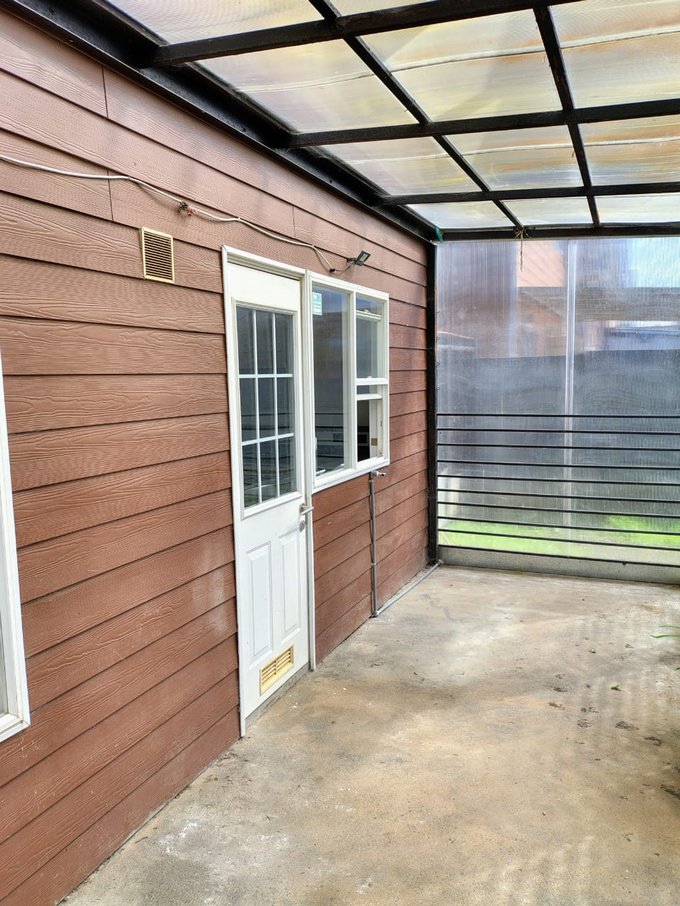 Terraza techada y cerrada