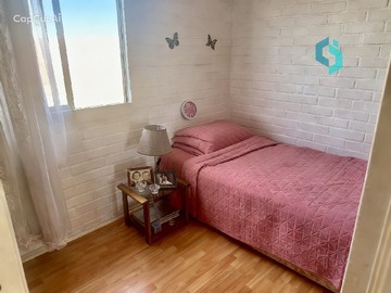 Dormitorio con clóset