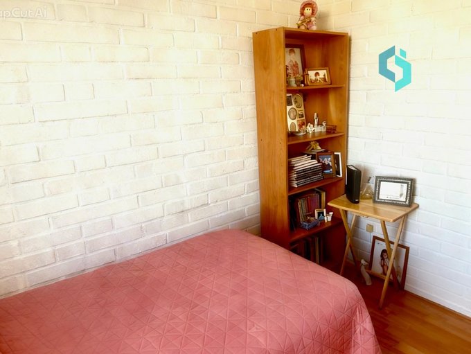 Dormitorio con clóset