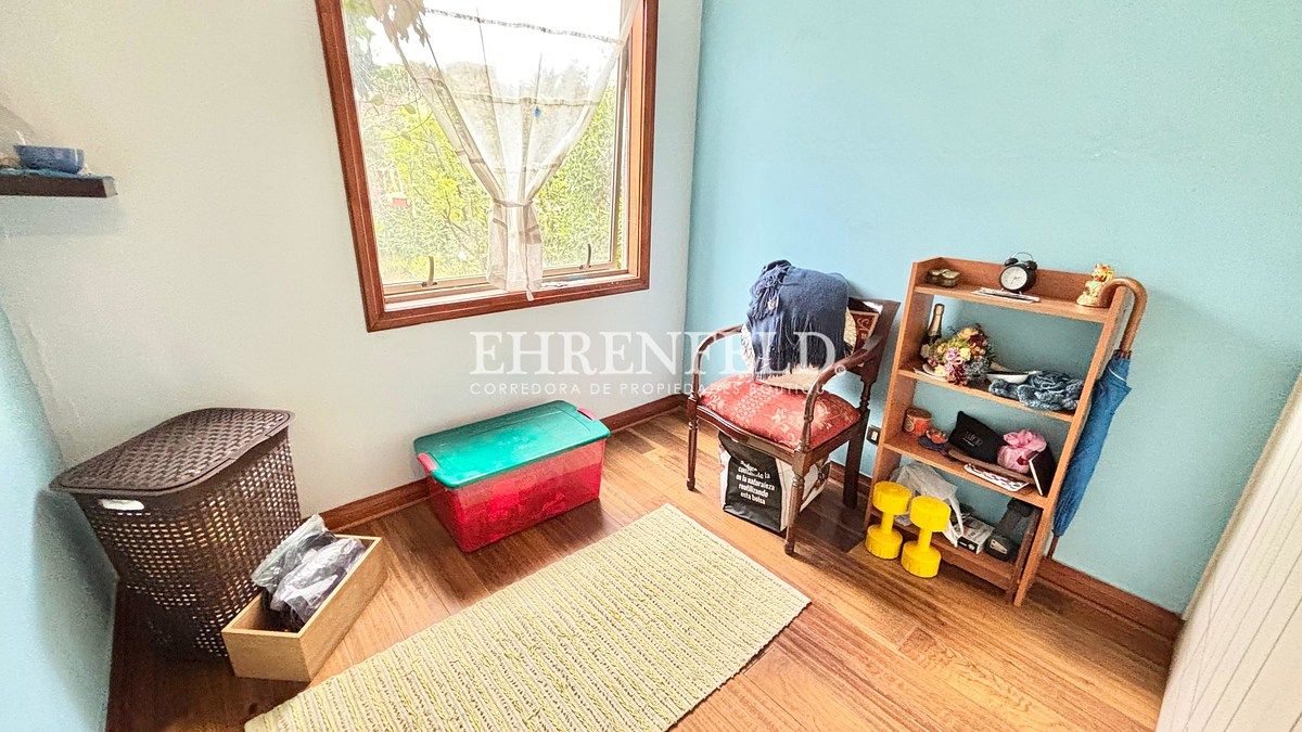 Dormitorio en suite.