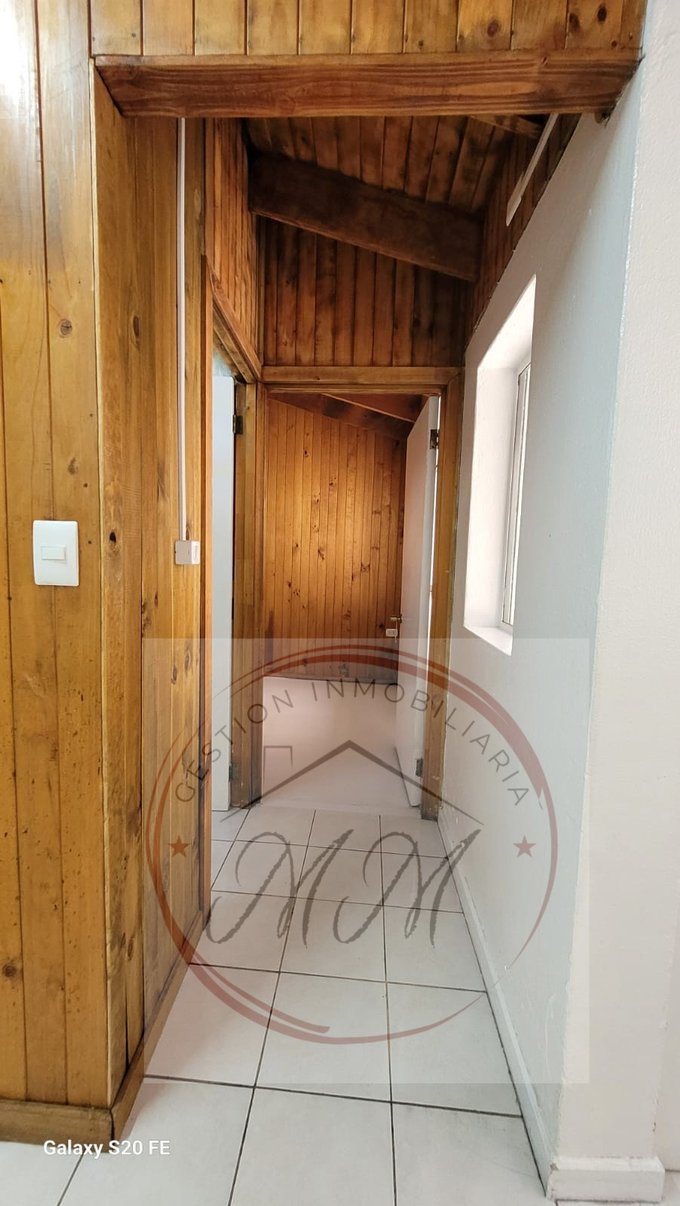 Pasillo a baño y Dormitorio