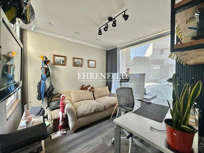 Sala de estar o cuarto dormitorio.