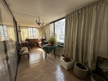 Terraza lateral cerrada