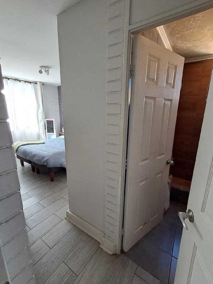 Dormitorio principal con baño en suite