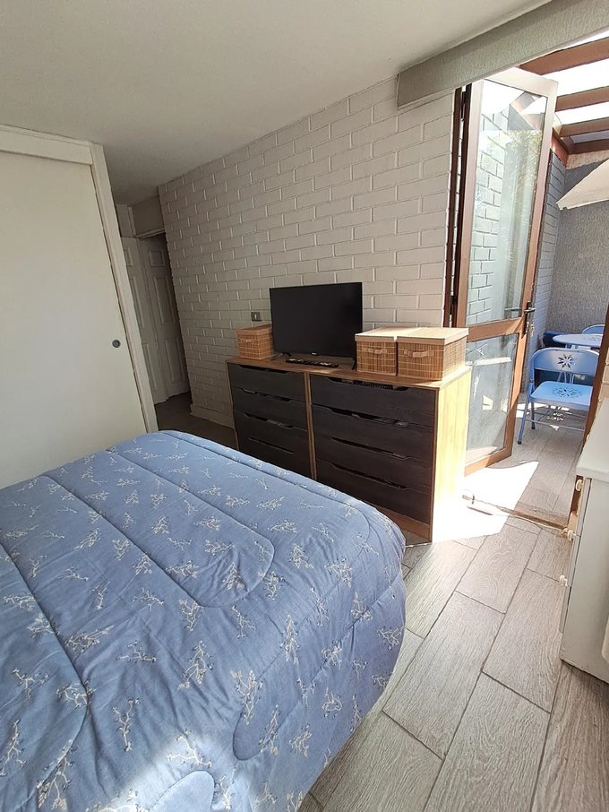 Dormitorio principal con salida a terraza techada termopanel