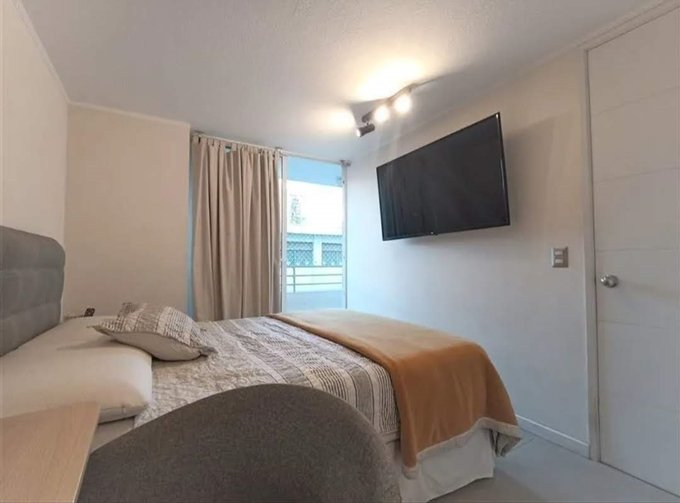 Dormitorio y terraza