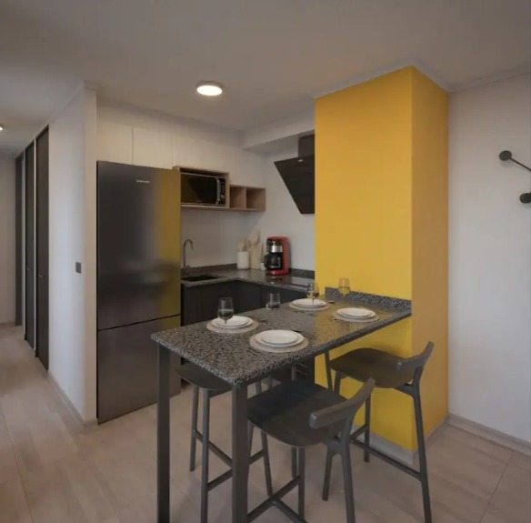 Cocina equipada estilo americano con equipamiento eléctrico