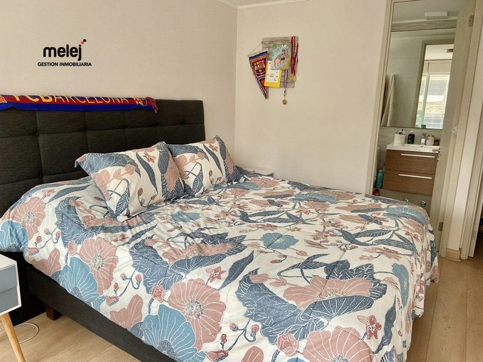 Dormitorio en suite con salida a terraza