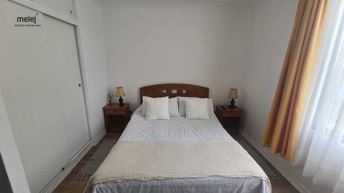 Dormitorio principal con closet